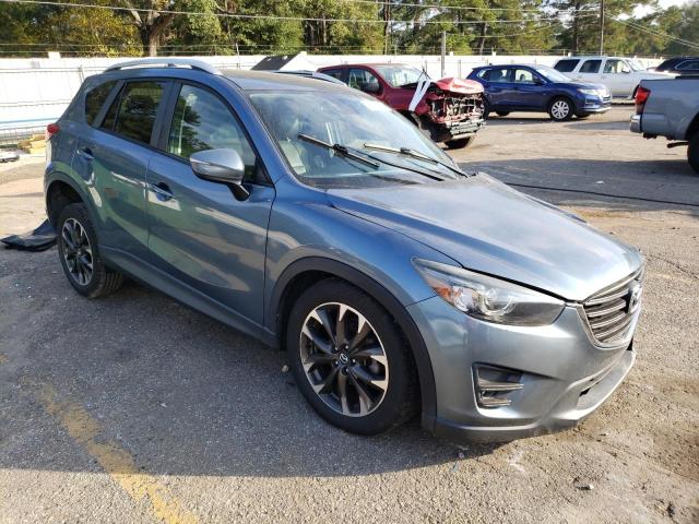 Photo 4 from auction – 2016 MAZDA CX-5 GT with VIN JM3KE2DY5G0676046