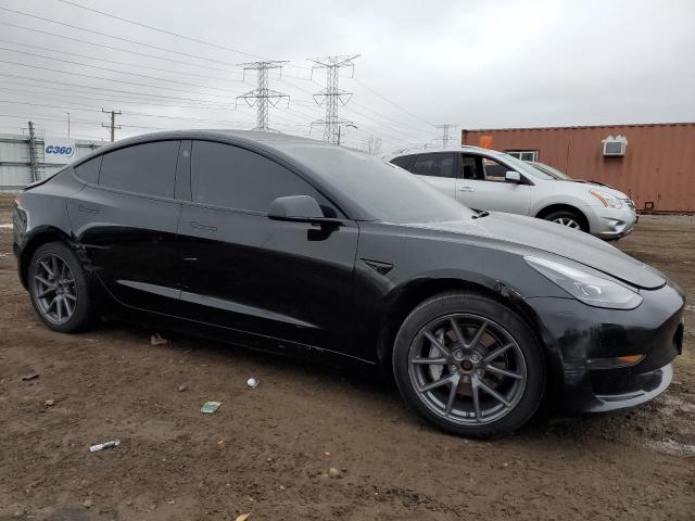 Photo 4 from auction – 2022 TESLA MODEL 3 with VIN 5YJ3E1EB7NF189771