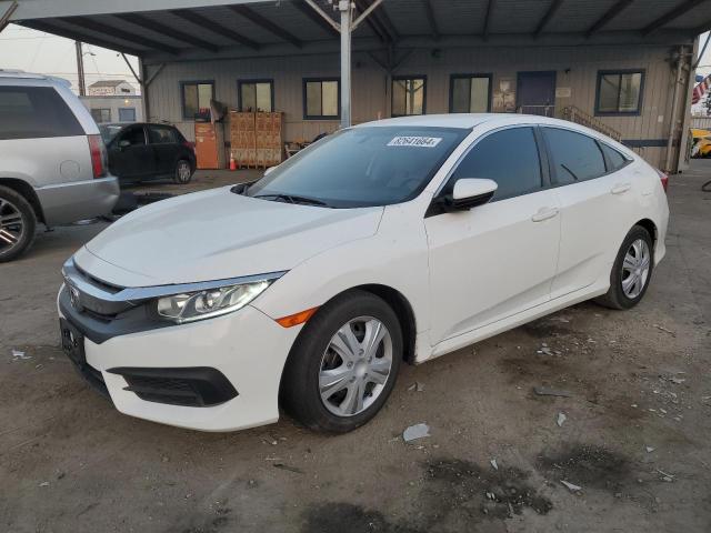Photo 1 from auction – 2018 HONDA CIVIC LX with VIN 2HGFC2F55JH597287