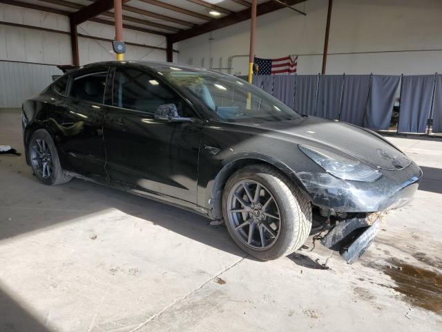 Photo 4 from auction – 2021 TESLA MODEL 3 with VIN 5YJ3E1EB3MF034049