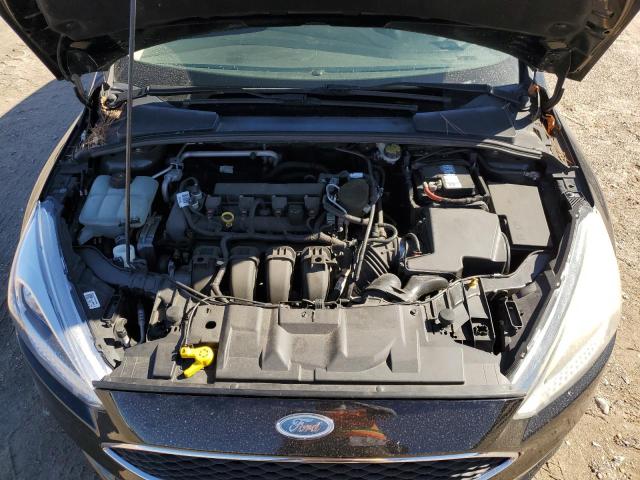Photo 12 from auction – 2015 FORD FOCUS SE with VIN 1FADP3K2XFL220983