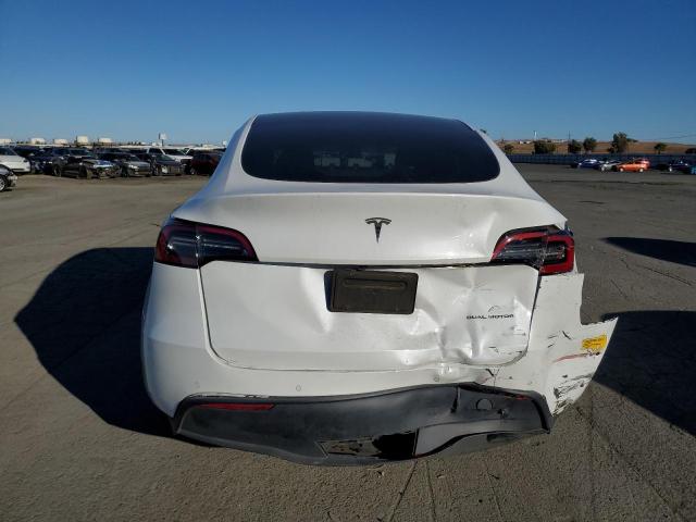 Photo 6 from auction – 2022 TESLA MODEL Y with VIN 7SAYGDEE0NF360312