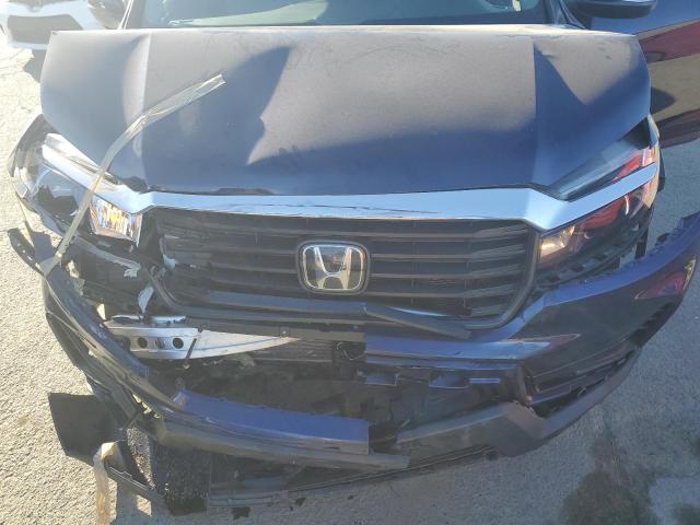 Photo 11 from auction – 2023 HONDA RIDGELINE with VIN 5FPYK3F59PB008747