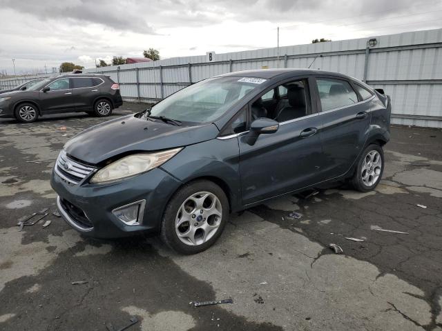 FORD FIESTA SEL 2011 with VIN 3FADP4CJ1BM121747 - Photo from auction
