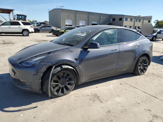 TESLA MODEL Y 2023 with VIN 7SAYGDEE6PA111934 - Photo from auction