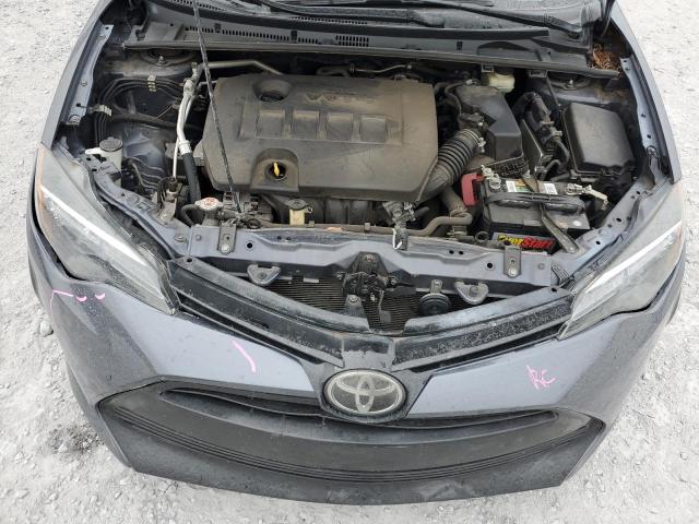 Photo 11 from auction – 2018 TOYOTA COROLLA with VIN 5YFBURHE9JP828945