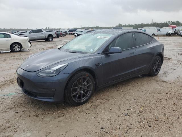 TESLA MODEL 3 2022 with VIN 5YJ3E1EA2NF352818 - Photo from auction