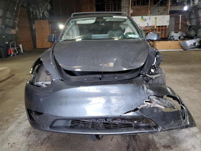 Photo 5 from auction – 2023 TESLA MODEL Y with VIN 7SAYGAEE7PF698212