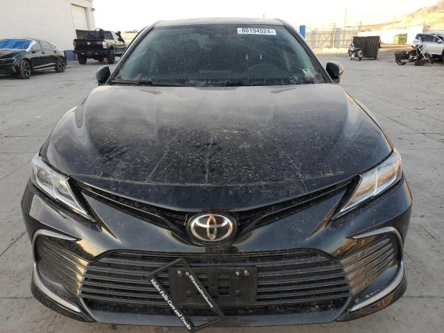 Photo 5 from auction – 2021 TOYOTA CAMRY LE with VIN 4T1C11AK3MU525919