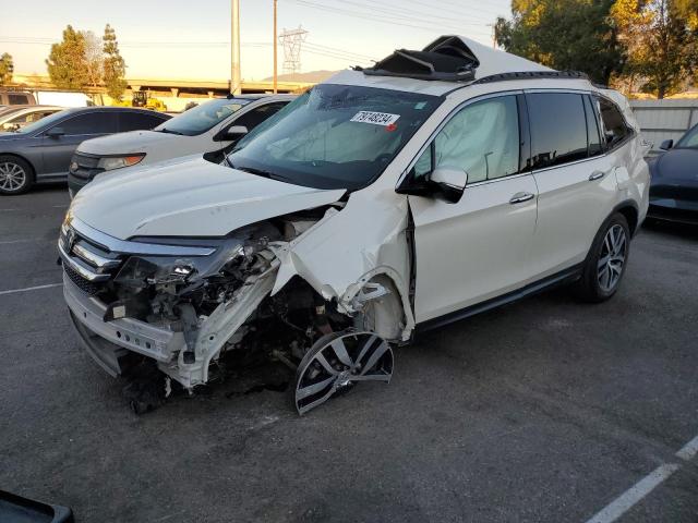 HONDA PILOT TOUR 2016 with VIN 5FNYF6H97GB056312 - Photo from auction