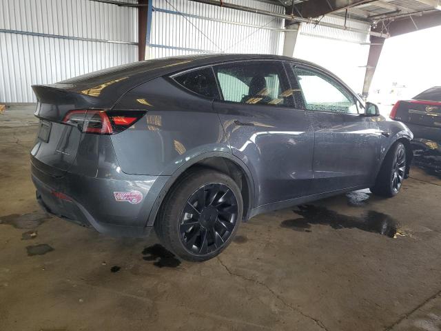 Photo 3 from auction – 2023 TESLA MODEL Y with VIN 7SAYGAEE5PF838581