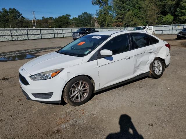 FORD FOCUS SE 2018 with VIN 1FADP3F21JL311868 - Photo from auction