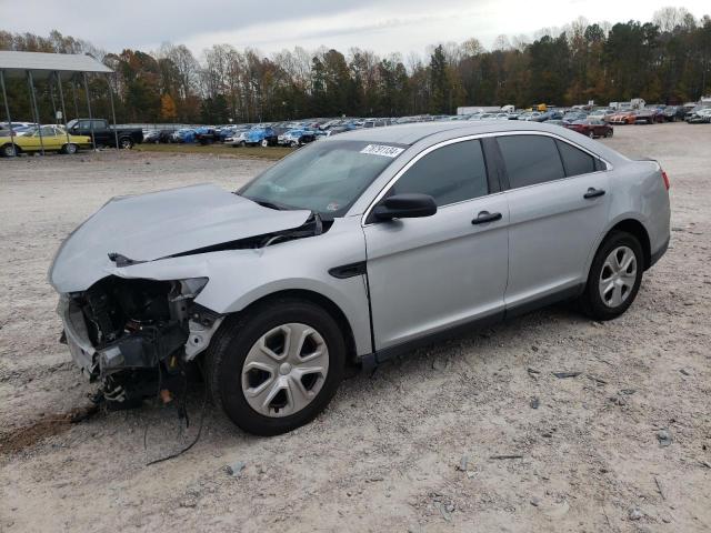 FORD TAURUS POL 2014 with VIN 1FAHP2L86EG129778 - Photo from auction