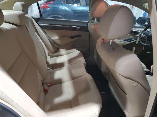 Photo 10 from auction – 2006 HONDA CIVIC HYBR with VIN JHMFA362X6S002819