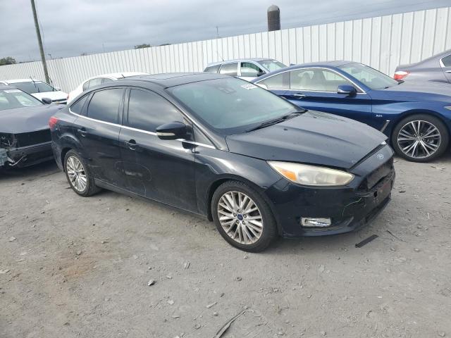 Photo 4 from auction – 2016 FORD FOCUS TITA with VIN 1FADP3J28GL224033