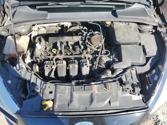 Photo 11 from auction – 2015 FORD FOCUS SE with VIN 1FADP3F20FL272911