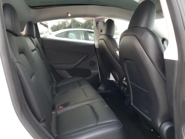 Photo 11 from auction – 2023 TESLA MODEL Y with VIN 7SAYGDEE4PA077203