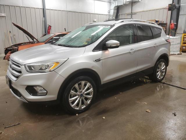 FORD ESCAPE TIT 2017 with VIN 1FMCU9J96HUB04009 - Photo from auction