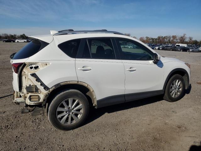Photo 3 from auction – 2013 MAZDA CX-5 TOURI with VIN JM3KE4CE9D0117503