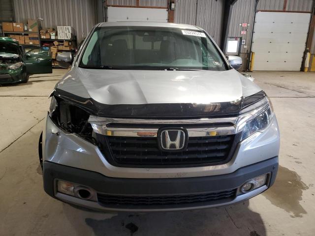 Photo 5 from auction – 2020 HONDA RIDGELINE with VIN 5FPYK3F70LB011550