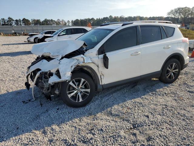 TOYOTA RAV4 XLE 2017 with VIN JTMWFREVXHJ718923 - Photo from auction