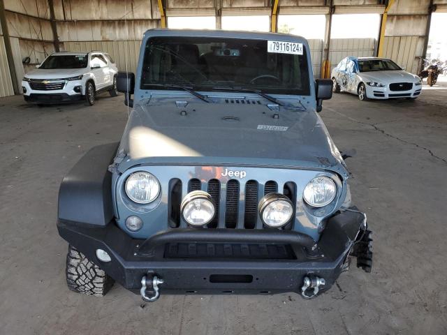 Photo 5 from auction – 2015 JEEP WRANGLER U with VIN 1C4BJWDG5FL702743