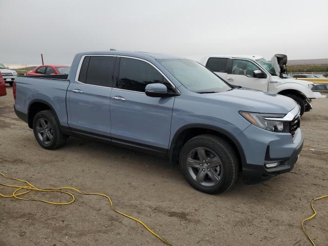 Photo 4 from auction – 2023 HONDA RIDGELINE with VIN 5FPYK3F77PB042820
