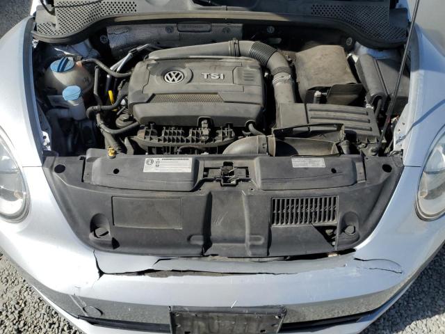 Photo 11 from auction – 2014 VOLKSWAGEN BEETLE with VIN 3VWF17AT5EM635256