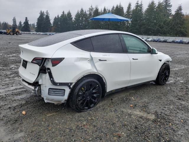 Photo 3 from auction – 2021 TESLA MODEL Y with VIN 5YJYGAEE4MF142836