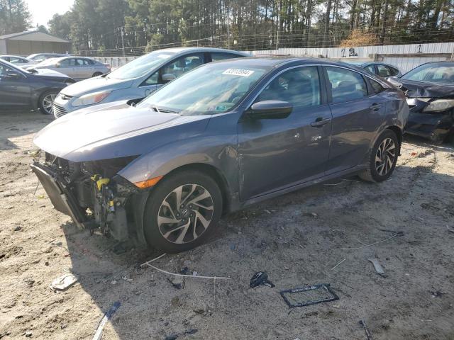 HONDA CIVIC EX 2017 with VIN 2HGFC2F7XHH572249 - Photo from auction