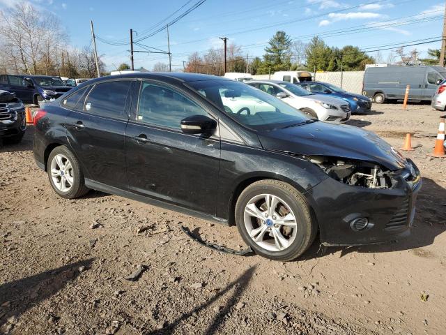 Photo 4 from auction – 2014 FORD FOCUS SE with VIN 1FADP3F24EL228313