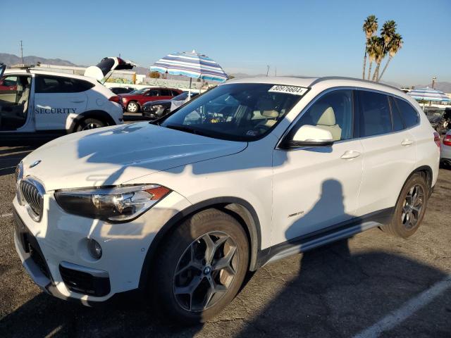 BMW X1 XDRIVE2 2016 with VIN WBXHT3C35GP889318 - Photo from auction