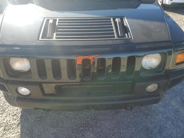 Photo 12 from auction – 2003 HUMMER H2 with VIN 5GRGN23UX3H136571