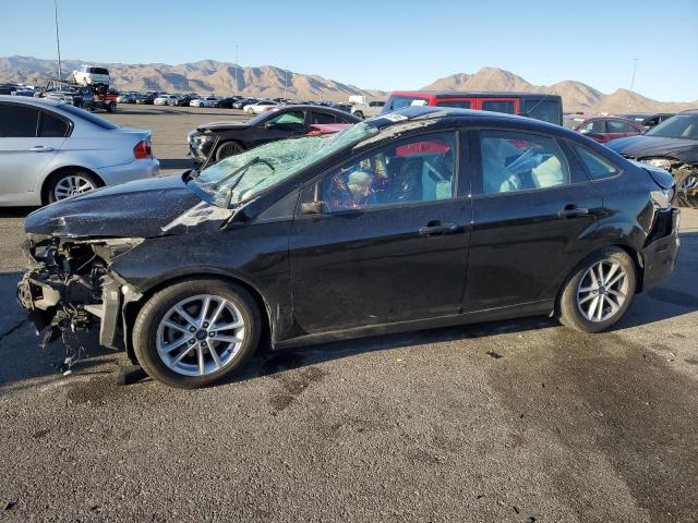 FORD FOCUS SE 2018 with VIN 1FADP3F24JL224885 - Photo from auction