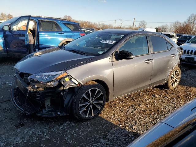 TOYOTA COROLLA L 2018 with VIN 5YFBURHE8JP812543 - Photo from auction