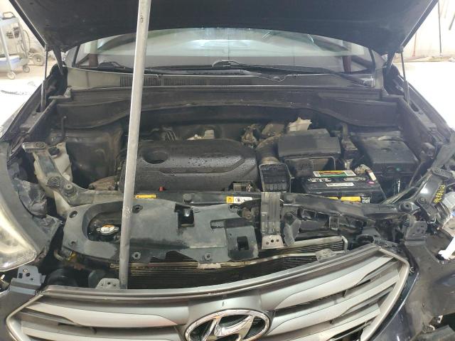Photo 12 from auction – 2017 HYUNDAI SANTA FE S with VIN 5NMZU3LB0HH041170