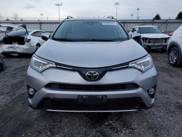 Photo 5 from auction – 2018 TOYOTA RAV4 LIMIT with VIN JTMDFREV2JD250360