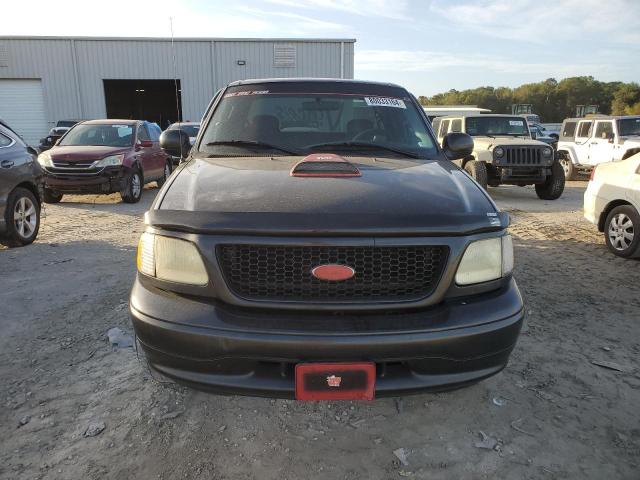 Photo 5 from auction – 2003 FORD F150 with VIN 1FTRX17293NB09855