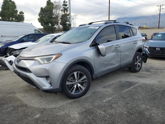 TOYOTA RAV4 ADVEN 2018 with VIN 2T3RFREV1JW823192 - Photo from auction