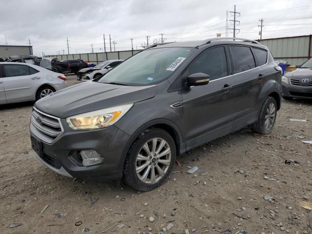 FORD ESCAPE TIT 2017 with VIN 1FMCU0JD4HUD75909 - Photo from auction