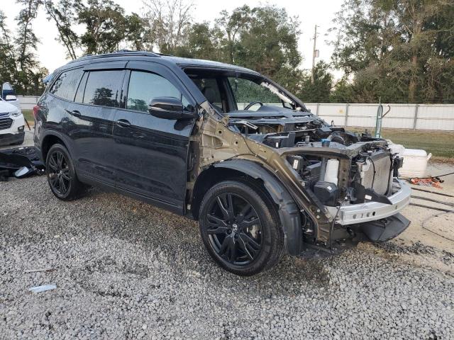 Photo 4 from auction – 2022 HONDA PILOT BLAC with VIN 5FNYF6H7XNB004667