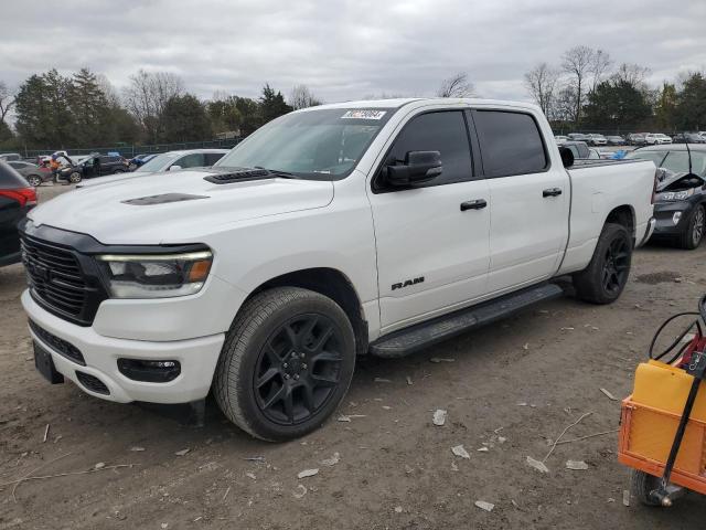 RAM 1500 LARAM 2023 with VIN 1C6SRFRT7PN568331 - Photo from auction