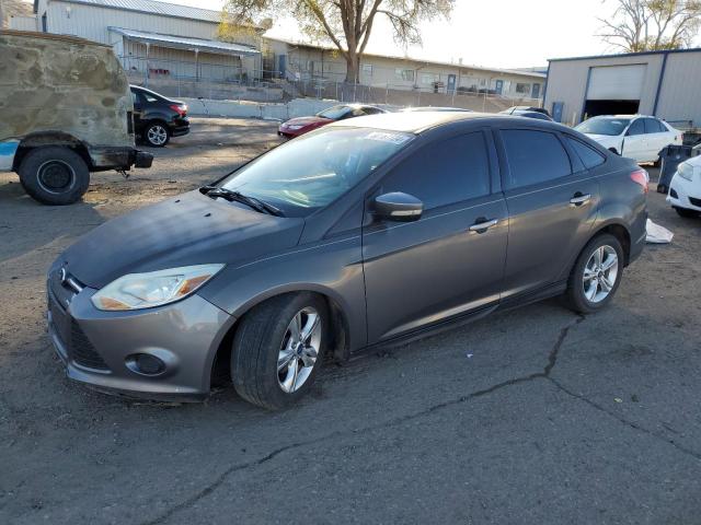 FORD FOCUS SE 2014 with VIN 1FADP3F24EL169635 - Photo from auction