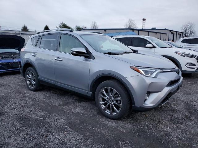 Photo 4 from auction – 2018 TOYOTA RAV4 LIMIT with VIN JTMDFREV2JD250360