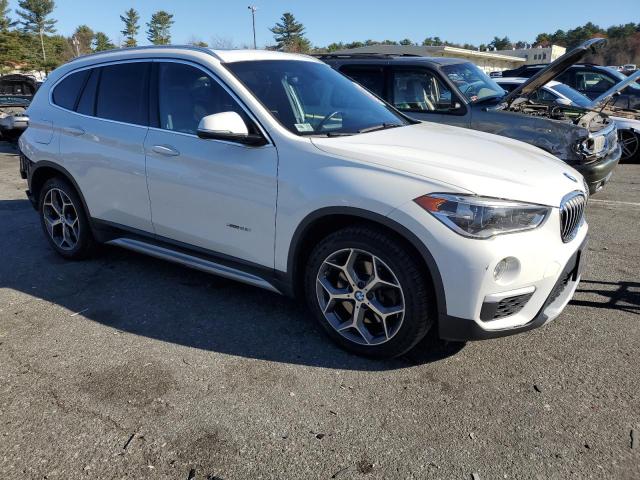 Photo 4 from auction – 2016 BMW X1 XDRIVE2 with VIN WBXHT3C32G5E52052