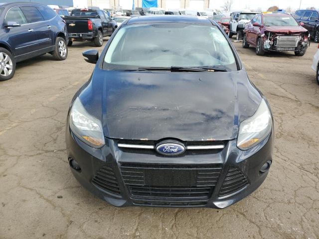 Photo 5 from auction – 2014 FORD FOCUS TITA with VIN 1FADP3J22EL241228