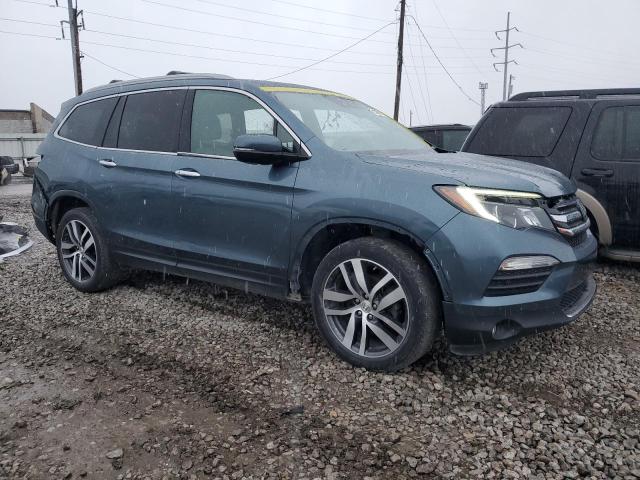Photo 4 from auction – 2018 HONDA PILOT ELIT with VIN 5FNYF6H01JB032659