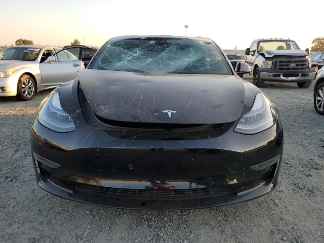Photo 5 from auction – 2021 TESLA MODEL 3 with VIN 5YJ3E1EA6MF067098