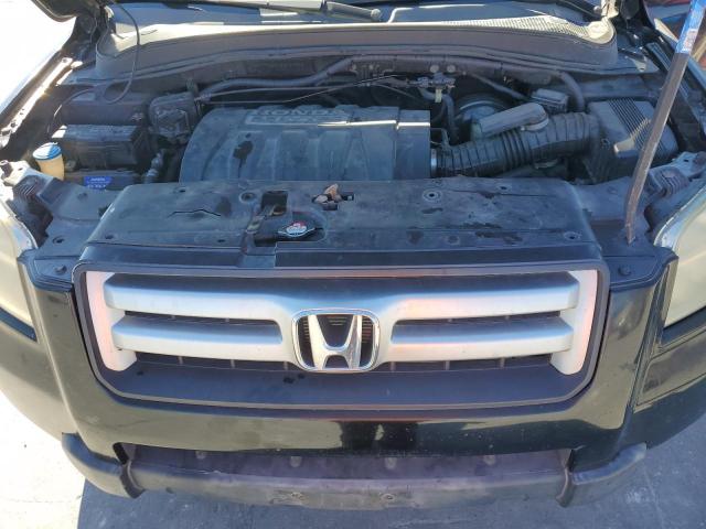 Photo 12 from auction – 2006 HONDA PILOT EX with VIN 5FNYF286X6B044832