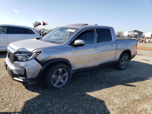 HONDA RIDGELINE 2022 z numerem VIN 5FPYK3F75NB023745 - Zdjęcie z aukcji